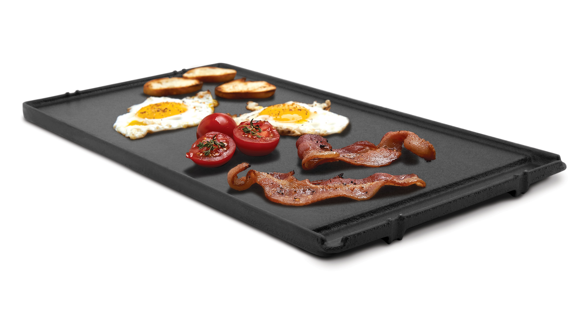 Breakfast foods arranged on the flat side of a Sovereign reversible griddle
