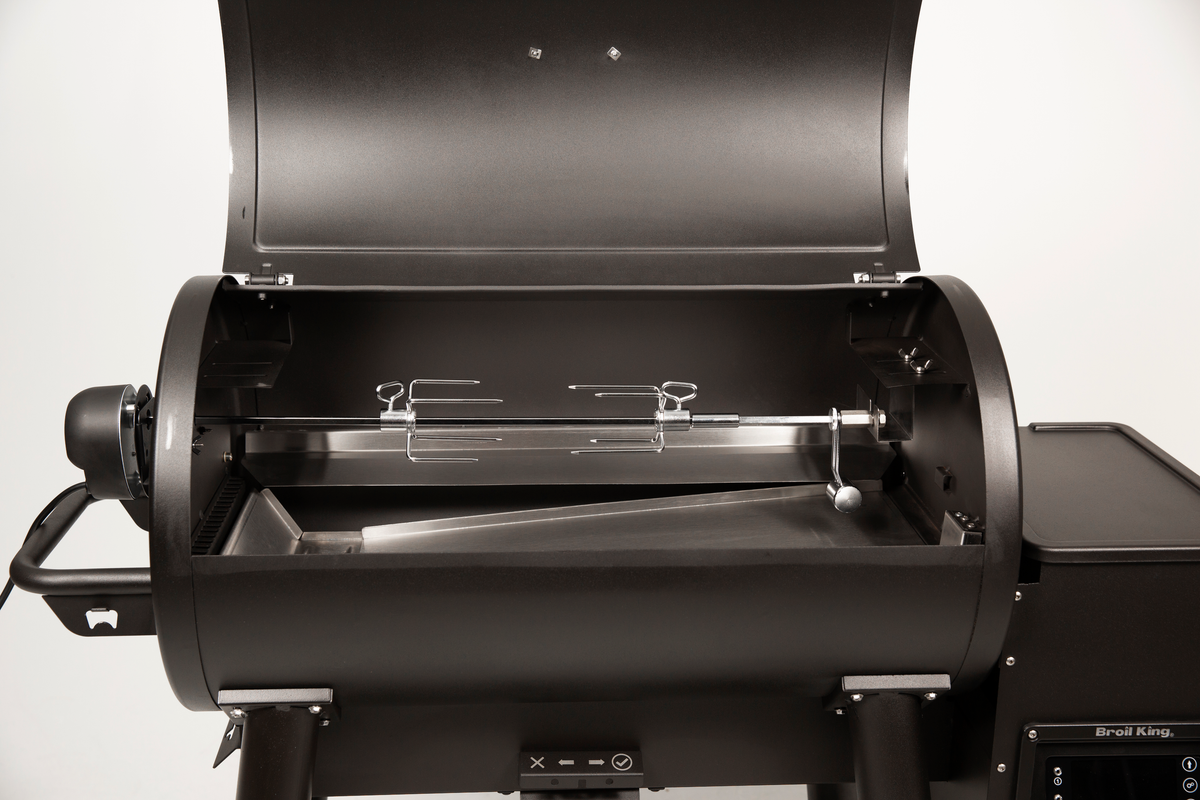 Rotisserie kit installed inside a separate pellet grill