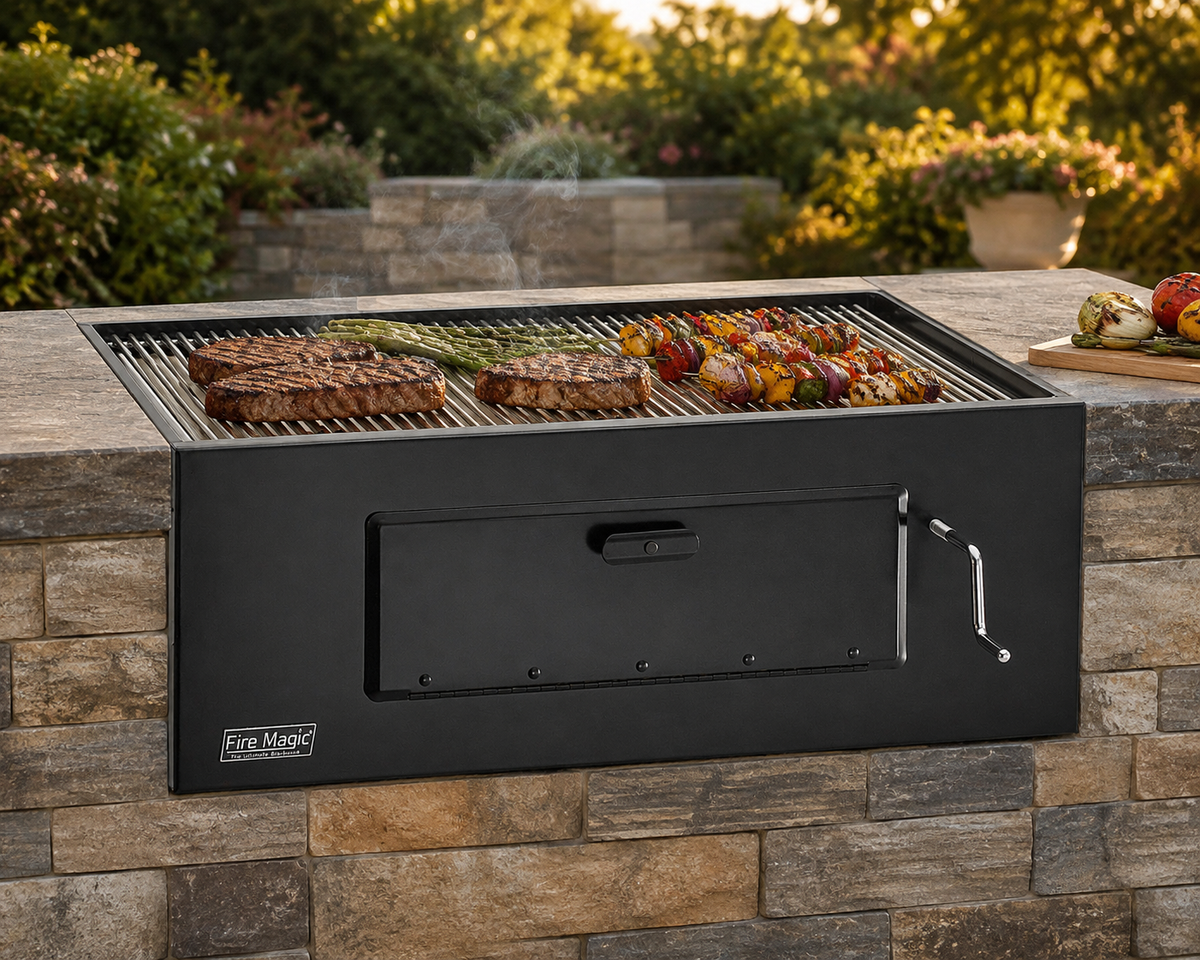 Lift-A-Fire 24″ Built-In Charcoal Grill in an outdoor cooking setting