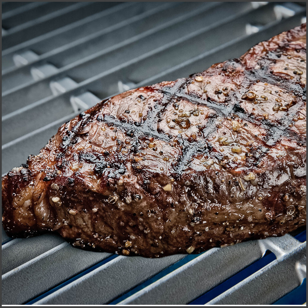 Imperial cast stainless steel grids with seared steak