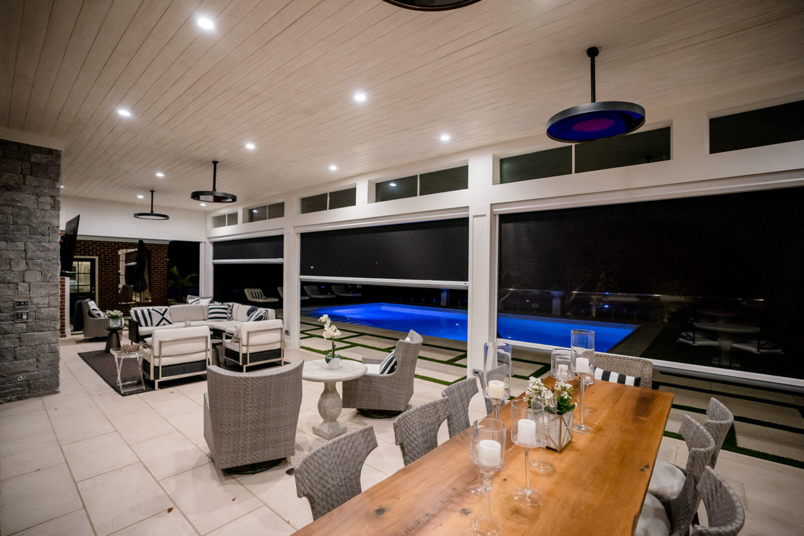 Eclipse pendant heaters above an outdoor seating area