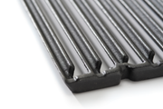 Close-up of cast iron cooking-grid rods and edges