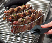 Rib rack holding several racks upright on the grill