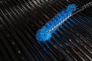 Blue nylon brush cleaning grill cooking grids