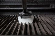 Ice grill brush cleaning the cooking grids