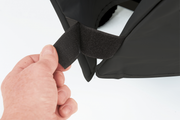 Hook-and-loop strap at the corner of a Select grill cover