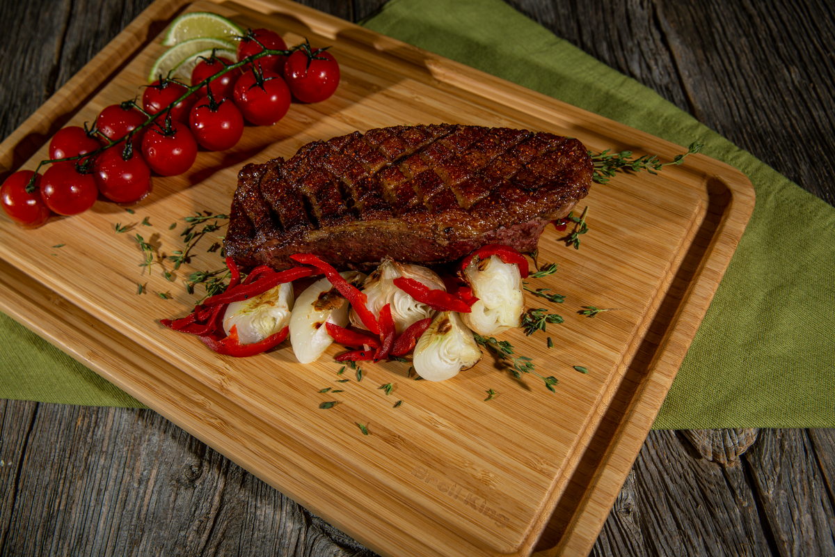 Steak and vegetables served on a Baron bamboo board