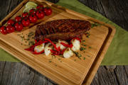 Steak and vegetables served on a Baron bamboo board