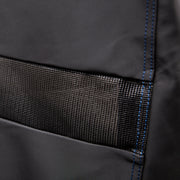Close-up of a premium grill-cover vent and blue stitching
