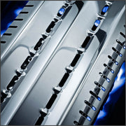 Stainless steel Flav-R-Wave plates beneath the cooking surface