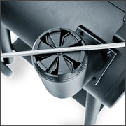 Adjustable damper at the charcoal grill chimney