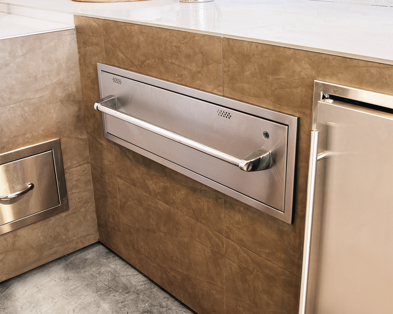 TrueFlame TF-WD-36 warming drawer shown in an outdoor kitchen; surrounding products sold separately