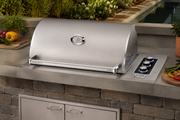 E540d drop-in grill cooking in an outdoor kitchen