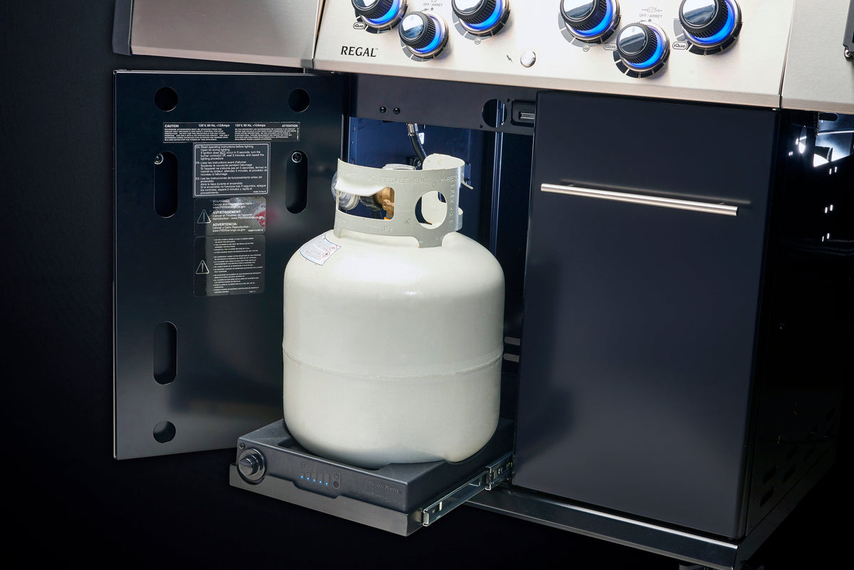 Tank scale holding a separate propane cylinder inside a grill cabinet