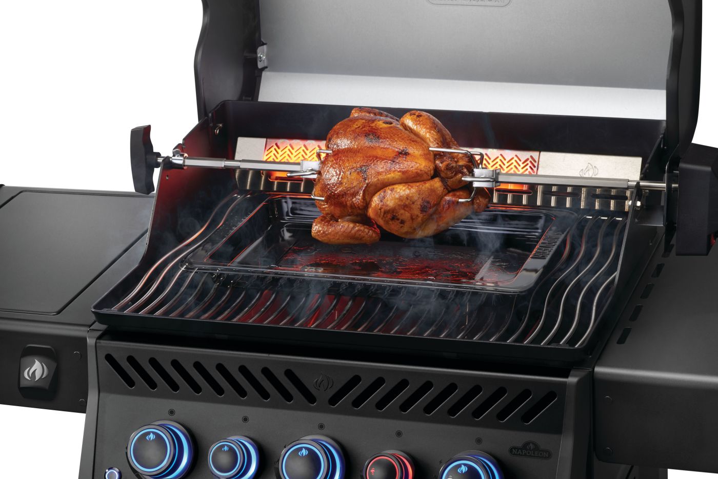 Napoleon Phantom Rogue PRO-S rotisserie cooking in front of the glowing rear burner